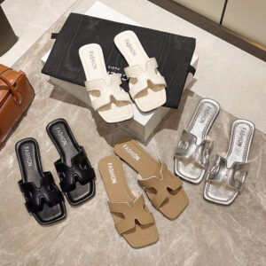 Minimalist H-Strap flat slides for women in black, white, tan, and silver colors